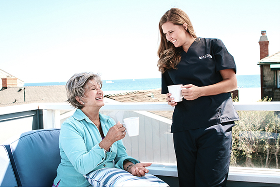 nurse taking care of elderly patient