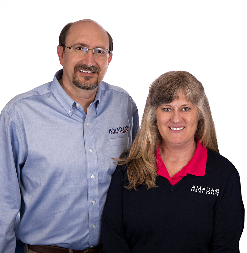 A Man And A Woman Pose For A Picture