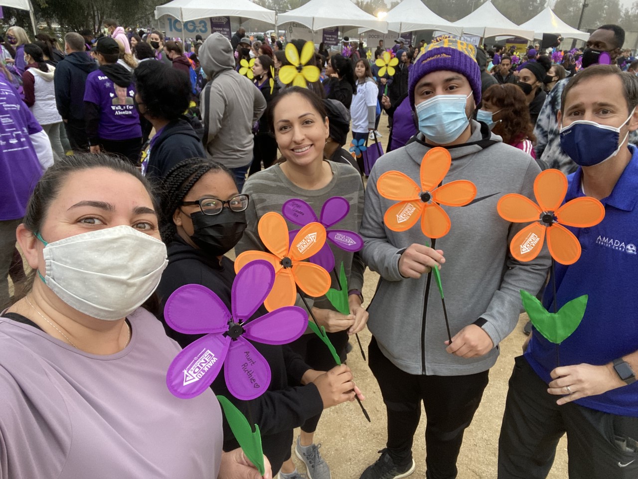 A group of people pose for the camera at the Walk to End Alzheimer's.