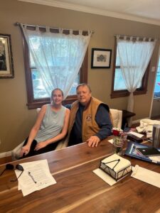 Care team sitting with senior veterans on Veterans Day