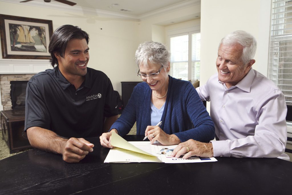 older couple with caregiver